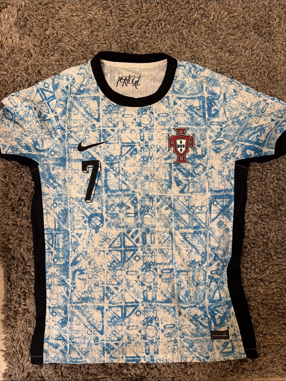 Nike men’s Blue and White Portugal Graphic Soccer Jersey